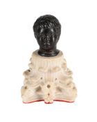 A SMALL BRONZE OF A BOY'S HEAD, POSSIBLY ROMAN