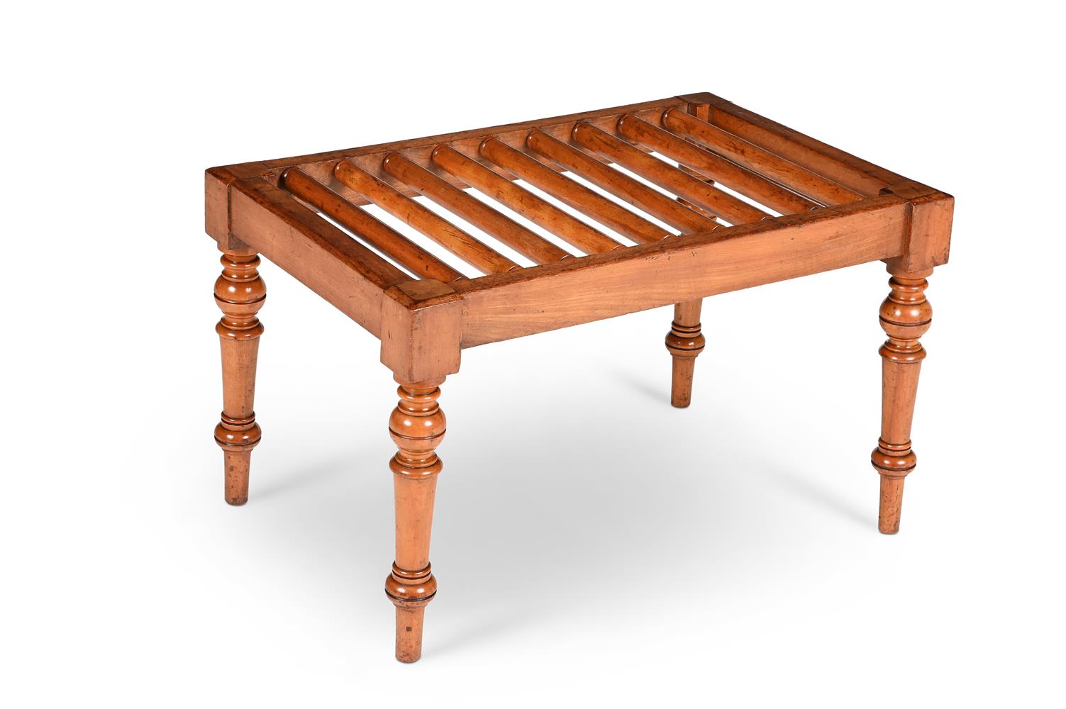 A VICTORIAN SATIN BIRCH LUGGAGE STAND, IN THE MANNER OF HOLLAND & SON, CIRCA 1850