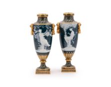A PAIR OF MINTON PÂTE SUR PÂTE TWO HANDLED VASES, BY ALBOIN BIRKS, EARLY 20TH CENTURY