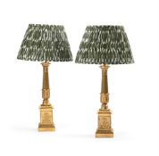 A PAIR OF FRENCH GILT METAL CARTEL LAMP BASES, EARLY 19TH CENTURY AND LATER FITTED