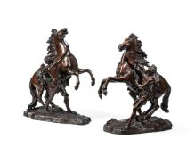 AFTER GUILLAUME COUSTOU (FRENCH 1677-1746), A LARGE PAIR OF BRONZE MARLY HORSES