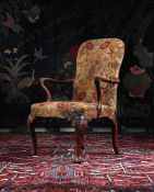 A GEORGE I WALNUT AND NEEDLEWORK UPHOLSTERED ARMCHAIR, IN THE MANNER OF GILES GRENDEY, CIRCA 1720