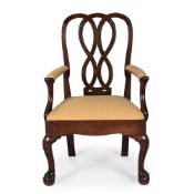 A GEORGE II CARVED MAHOGANY ARMCHAIR, IRISH, CIRCA 1745