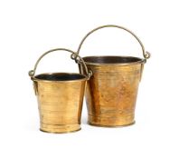 A GRADUATED NEAR PAIR OF COLONIAL BRASS BUCKETS, 18TH OR 19TH CENTURY