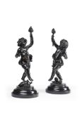 A PAIR OF BRONZE BACCHIC CHERUBS ON MARBLE BASES, 19TH CENTURY