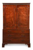 A GEORGE III MAHOGANY CLOTHES PRESS, CIRCA 1780