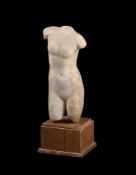 A SMALL ROMAN MARBLE TORSO OF APHRODITE, CIRCA 2ND CENTURY A.D.
