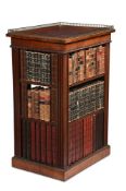 AN UNUSUAL REGENCY MAHOGANY AND GILT BRASS MOUNTED FREESTANDING OPEN BOOKCASE, CIRCA 1815