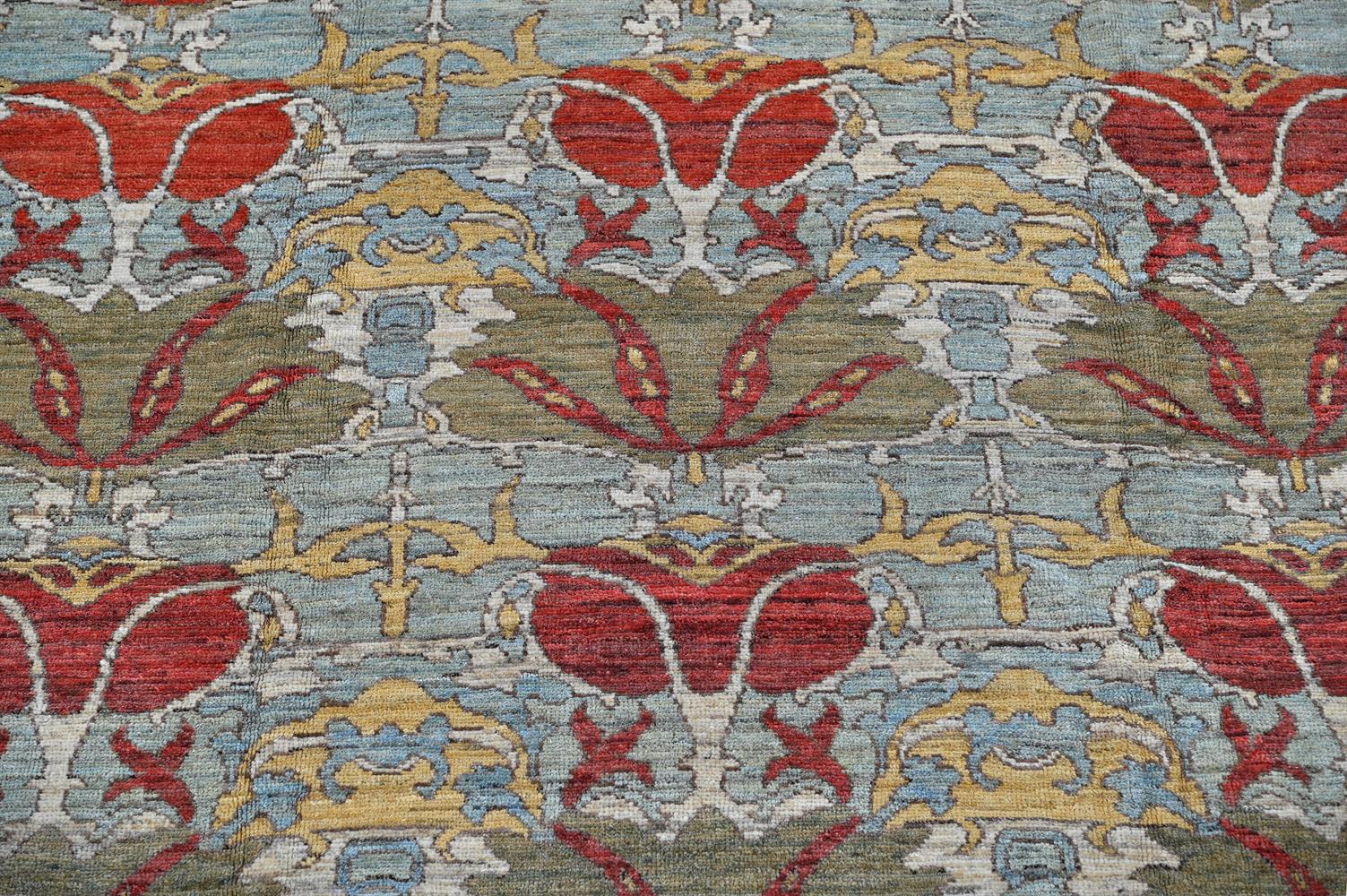AN USHAK CARPET, AFTER DESIGNS BY C. F. A. VOYSEY, approximately 442 x 354cm - Image 2 of 3