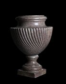 A LARGE PINK GRANITE URN, POSSIBLY FRENCH, 19TH CENTURY