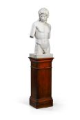 AFTER THE ANTIQUE, A PLASTER FIGURE OF EROS OF CENTOCELLE WITH A MAHOGANY PEDESTAL