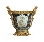 AN ORMOLU MOUNTED JAPANESE ARITA VASE, THE VASE LATE 17TH OR EARLY 18TH CENTURY, THE MOUNTS LATER
