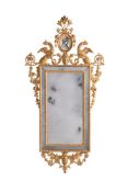 AN ITALIAN GILTWOOD AND COMPOSITION MIRROR, LATE 18TH OR EARLY 19TH CENTURY