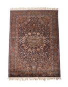 A KASHAN PART SILK RUG, approximately 172 x 112cm
