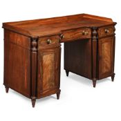 A REGENCY MAHOGANY KNEEHOLE DRESSING TABLE, BY GILLOWS, CIRCA 1807