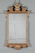 A GEORGE I GILTWOOD MIRROR, CIRCA 1725