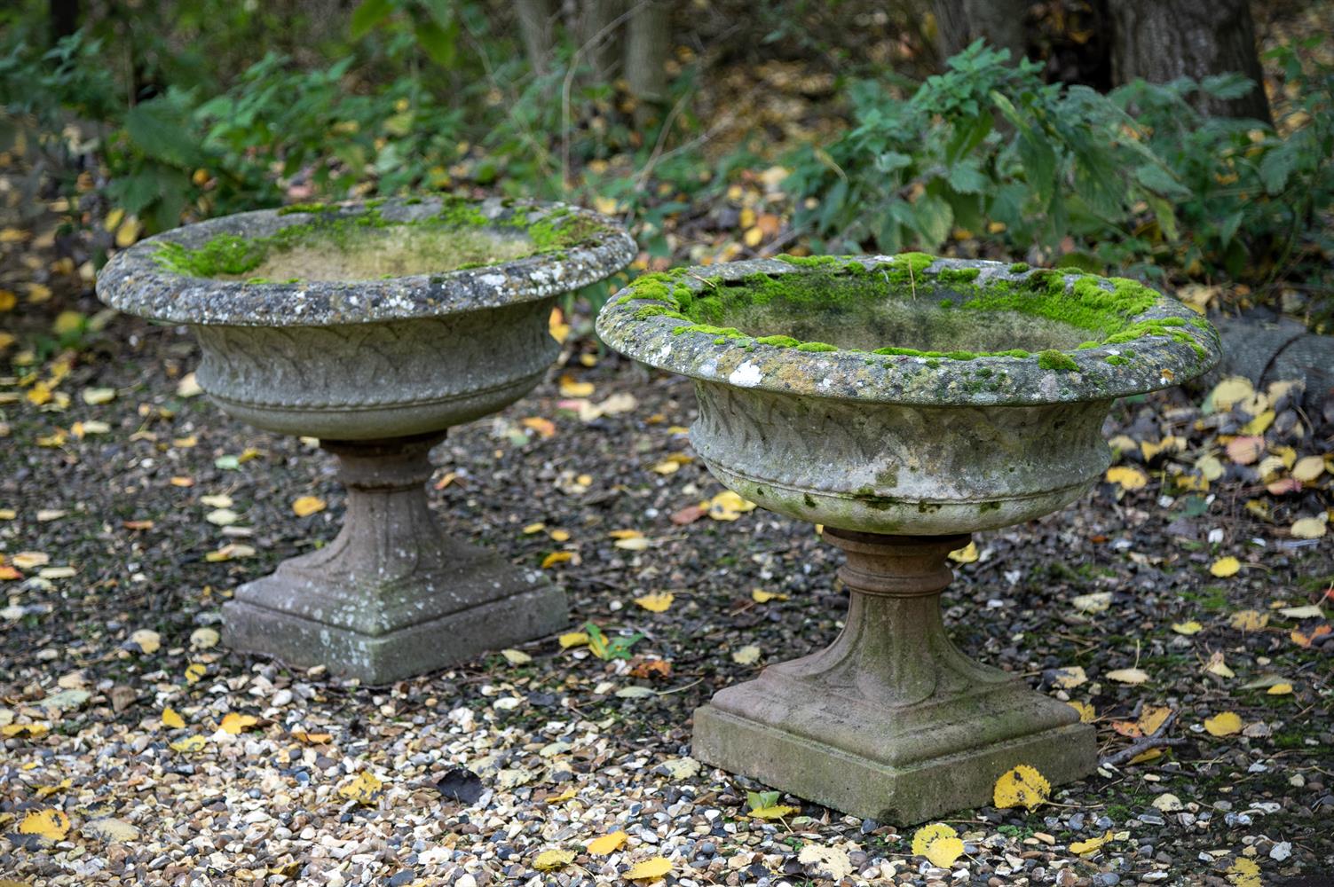 A PAIR OF STONE COMPOSITION VASES, IN THE MANNER OF J. M. BLASHFIELD, 20TH CENTURY