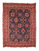 A TURKEY RUG OF ‘SMALL-PATTERNED HOLBEIN' DESIGN, approximately 175 x 135cm