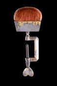 A STEEL AND GILDED PIN CUSHION/SEWING CLAMP, RUSSIA TULA OR SWEDEN