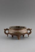 A CHINESE BRONZE TWIN HANDLED CENSER, 17TH/18TH CENTURY