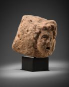 A MEDIEVAL STONE HEAD OF A SINGING FIGURE, 14TH/15TH CENTURY