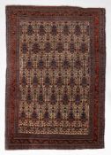 A NORTH WEST PERSIAN RUG, 20TH CENTURY
