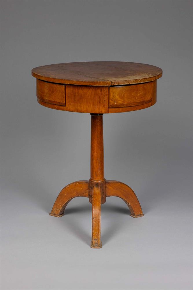 A CIRCULAR CHERRY WOOD DRUM SIDE TABLE