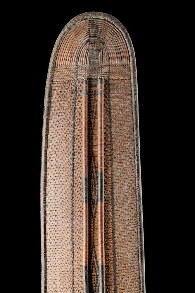 A CENTRAL AFRICAN MONGO SAKA PEOPLES LONG OVAL WICKERWORKED SHIELD, DEMOCRATIC REPUBLIC OF CONGO - Image 6 of 7