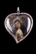 A LARGE HEART SHAPED ROCK CRYSTAL SILVER MOUNTED RELIQUARY, 17TH CENTURY