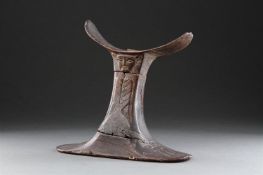 A RARE AND FINELY CARVED EGYPTIAN WOODEN HEADREST, RAMESSID PERIOD