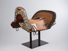 A RARE WESTERN TIBETAN HORSE SADDLE AS USED BY THE KAMPA HORSEMEN, 19TH CENTURY