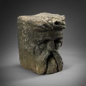 A CARVED STONE CORBEL HEAD, 14TH/15TH CENTURY