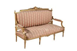 A FRENCH GILTWOOD SETTEE, IN LOUIS XVI STYLE, LATE 19TH CENTURY