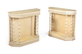 A PAIR OF CREAM PAINTED SIDE OR CONSOLE TABLES, IN THE MANNER OF OLIVER MESSEL, LATE 20TH CENTURY