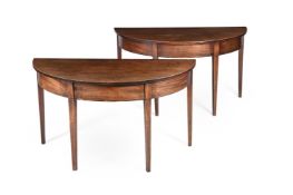 A PAIR OF GEORGE III MAHOGANY AND LINE INLAID DEMI-LUNE CONSOLE TABLES, CIRCA 1800 AND LATER