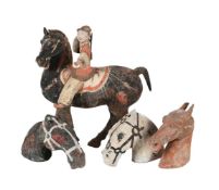 A CHINESE POTTERY FIGURE OF A HORSE AND AN ARCHER, HAN DYNASTY