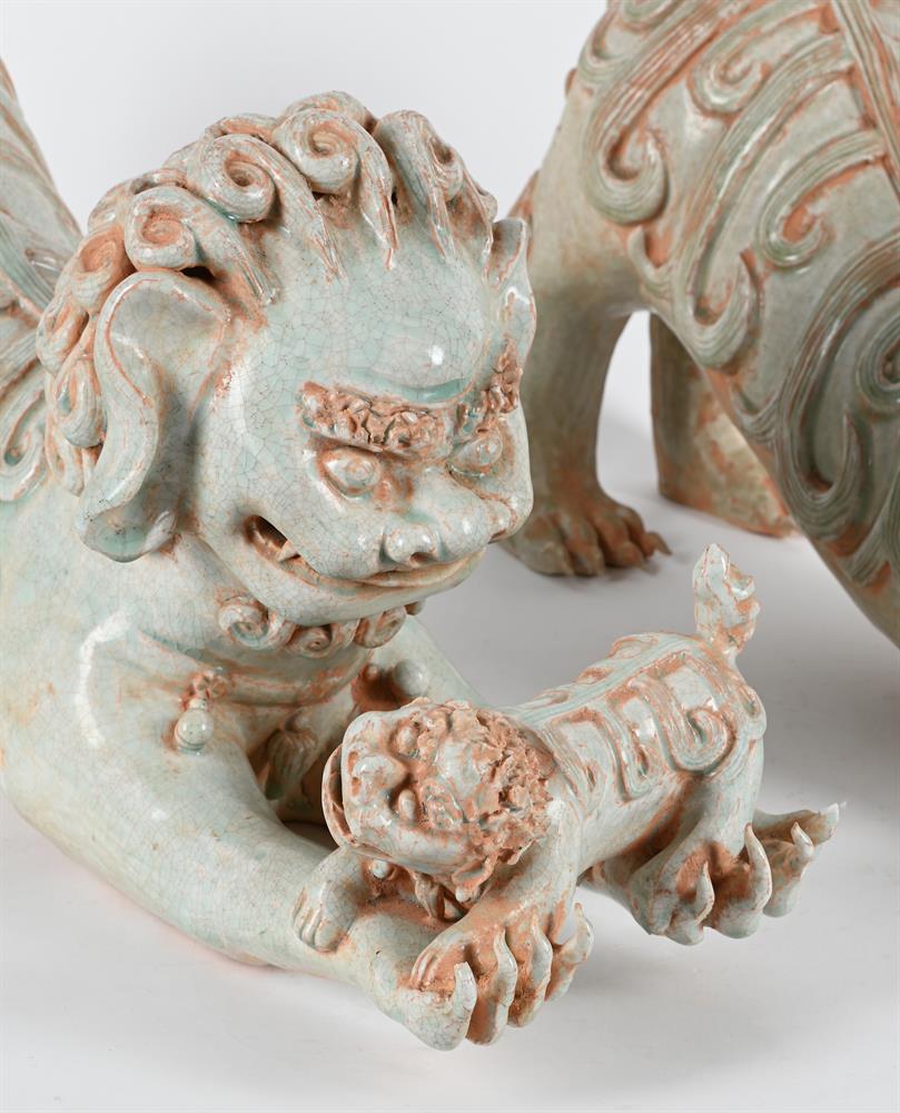 A PAIR OF CHINESE PORCELAIN CELADON GLAZE MODELS OF LIONS WITH A CUB OR A BOCADE BALL20TH CENTURY - Image 4 of 5