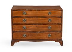 A GEORGE III MAHOGANY AND LINE INLAID SERPENTINE FRONTED DRESSING CHEST OF DRAWERS, CIRCA 1800