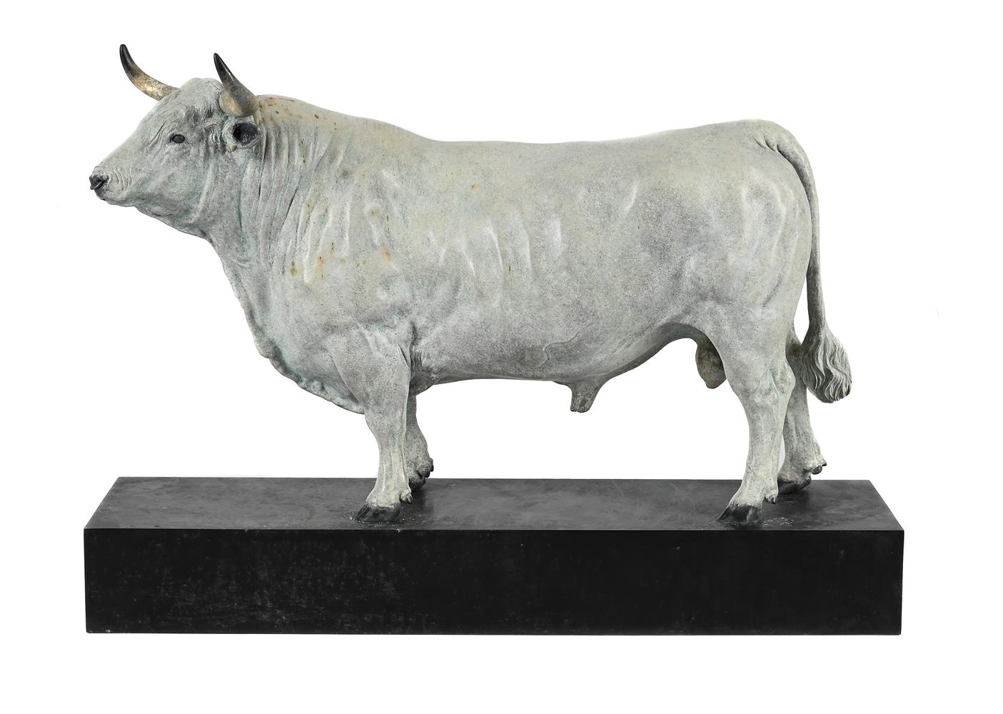 A COLD-PAINTED METAL MODEL OF A STANDING BULL