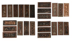 A SET OF TWENTY FOUR CHINESE CARVED PANELS, 19TH CENTURY