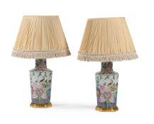 A PAIR OF CERAMIC LAMPS DECORATED IN THE 'TOBACCO LEAF' PATTERN