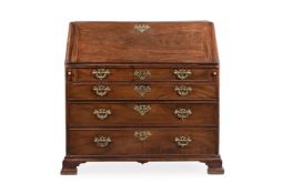 A GEORGE III MAHOGANY BUREAU, CIRCA 1770