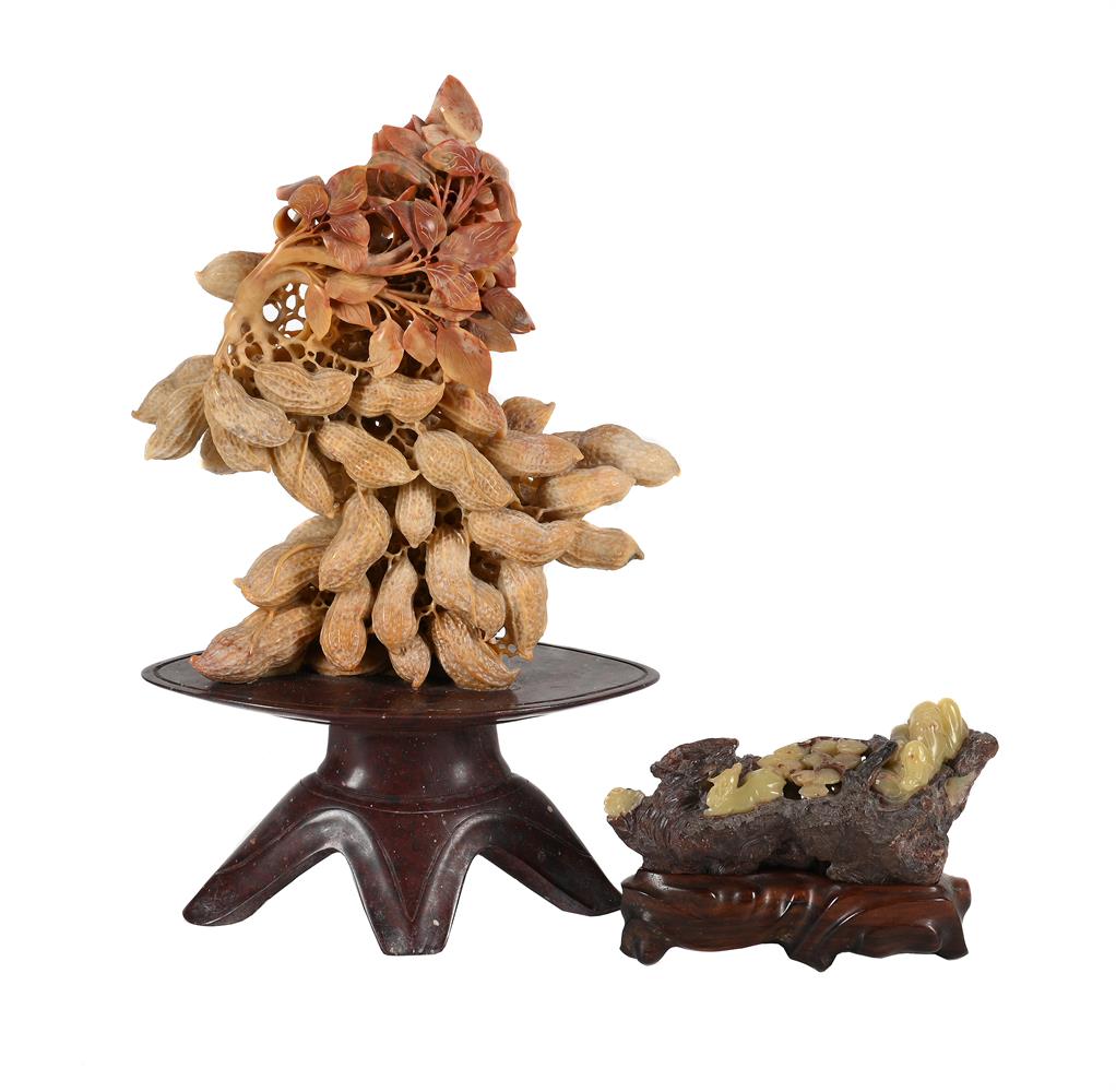 A CHINESE SOAPSTONE CARVING OF PEANUTS AND ROOTS, AND ANOTHER OF A 'SHOU LOU' DEER AND A PINE TREE