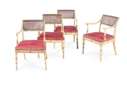 A SET OF FOUR REGENCY CREAM AND POLYCHROME PAINTED OPEN ARMCHAIRS BY JOHN GEE