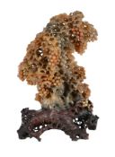 A CHINESE SOAPSTONE CARVING OF SQUIRRELS AMONGST FRUITING WINE, 20TH CENTURY