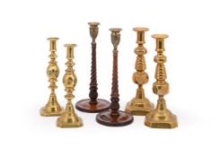 A PAIR OF GEORGE III MAHOGANY AND BRASS MOUNTED CANDLESTICKS, POSSIBLY SCOTTISH, CIRCA 1790