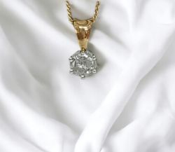 0.15CT DIAMOND PENDANT & CHAIN 9CT YELLOW GOLD