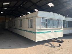 TUDOR LAKELAND CARAVAN: 3 BEDS, 2 BATHS, EXTERNAL STORAGE - YOUR ULTIMATE RETREAT