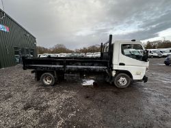 RELIABLE 2015 MITSUBISHI CANTER TIPPER: TURBO POWER, HONEST WORK VAN