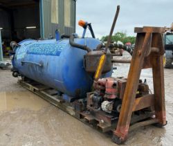 WHALE VACUUM TANKER MOUNTED ON HOOK LOADER SKIDS
